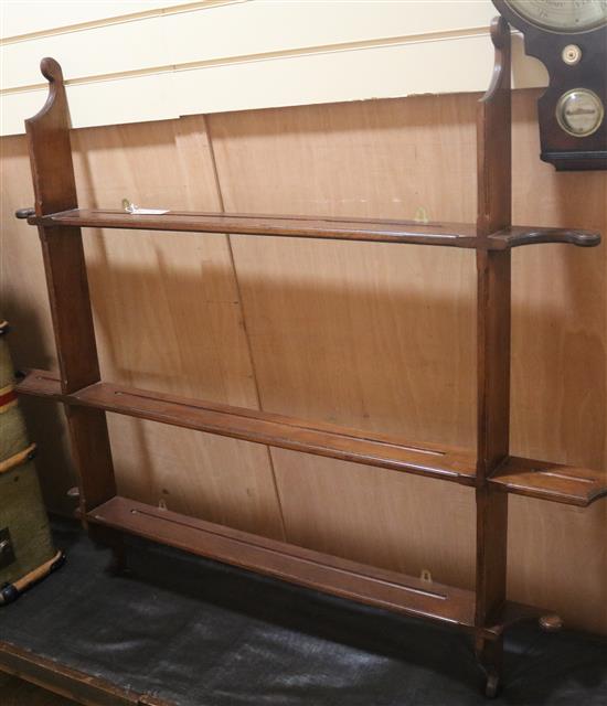 An Edwardian mahogany wall shelf W.148cm